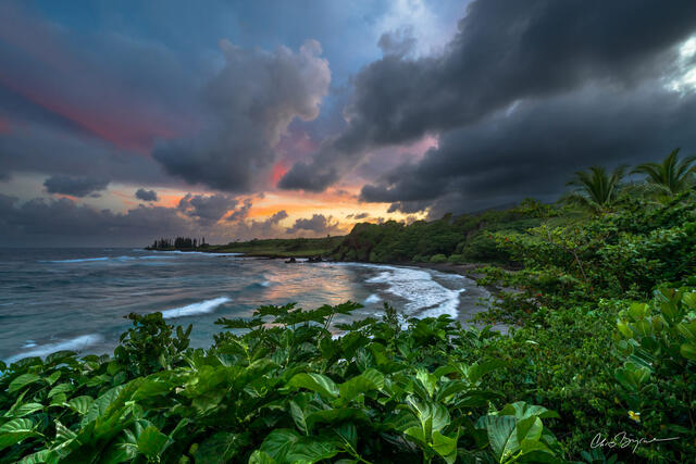 The sun rises at Hamoa Beach in Hana on the island of Maui